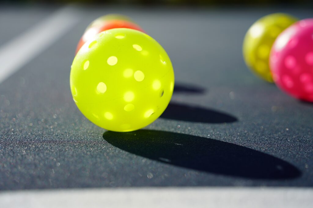 Pickleball balls on court