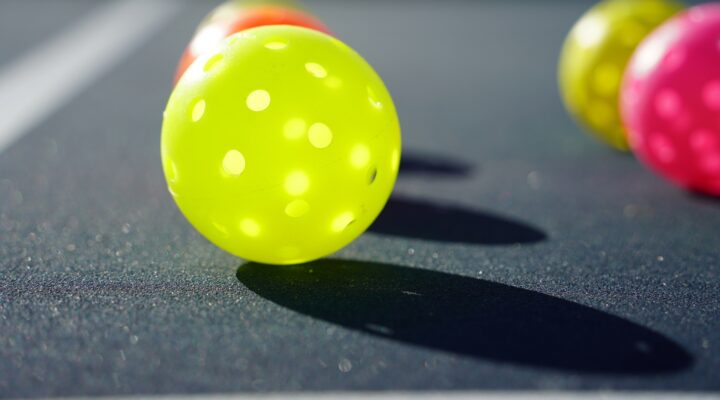 Pickleball balls on court