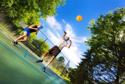 Two people enjoying a game of pickleball.